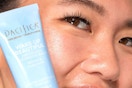 a woman holding a pacifica cleansing balm