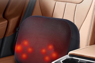 a back massager on a car seat