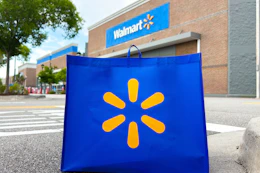 Walmart reusable tote bag in front of Walmart store