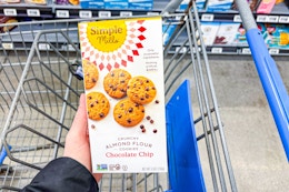 hand holding a Simple Mills cookie box