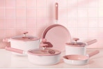 CAROTE Ceramic Cookware Set Nonstick, 15pcs on a pink kitchen counter.