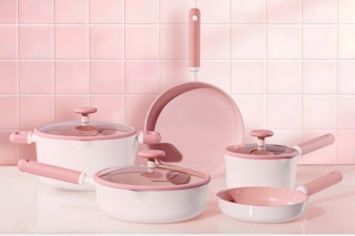 CAROTE Ceramic Cookware Set Nonstick, 15pcs on a pink kitchen counter.
