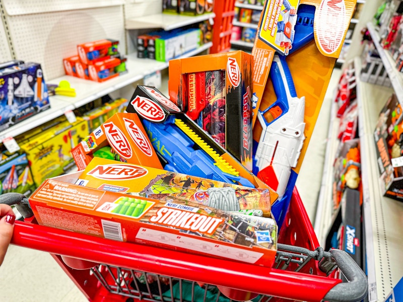 hand pushing target cart with nerf blasters