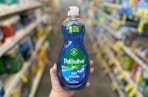 hand holding palmolive dish soap