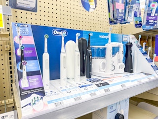 oral-b toothbrushes on a walgreens display