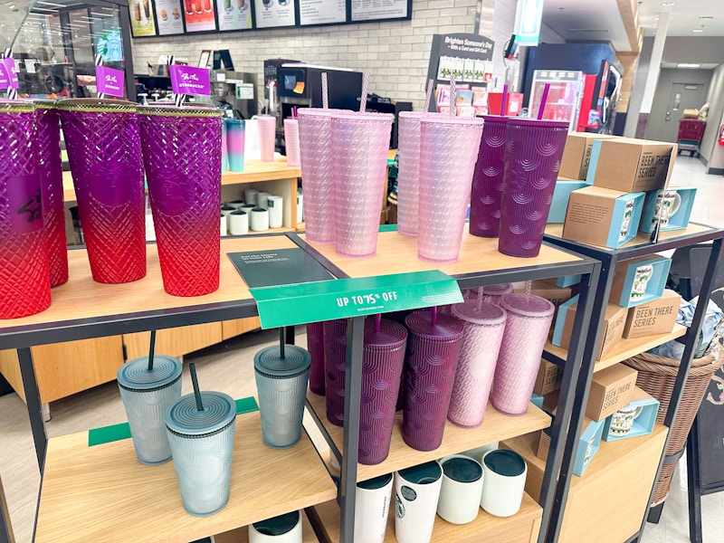 assorted starbucks tumblers on target shelves