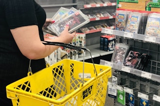 woman with yellow basket shops best buy games