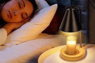 a woman near a candle warmer lamp