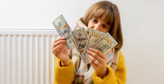 A person counting cash