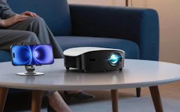 a projector on a wooden table