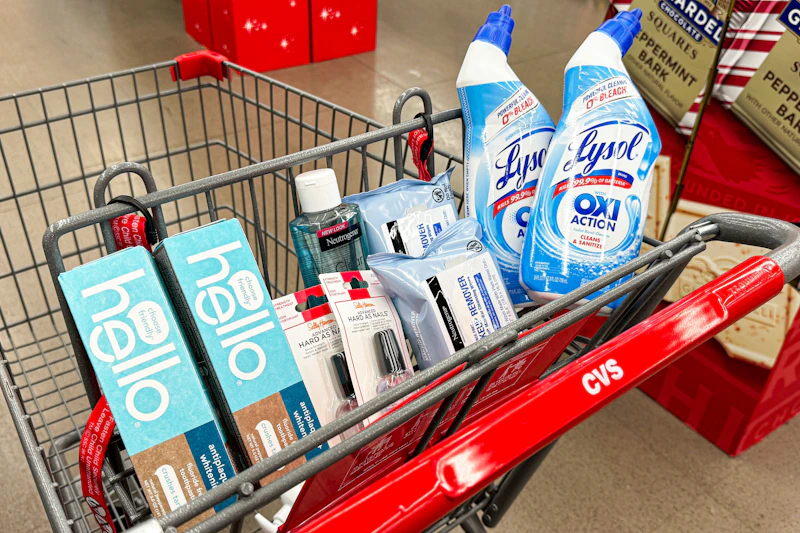 hello toothpaste, sally hansen hard as nails, neutrogena astringent, neutrogena makeup wipes, and lysol toilet cleaner in a cart
