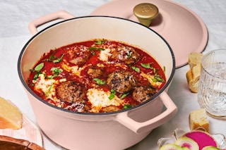 navy dutch oven with food inside