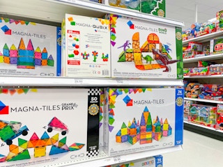 shelf with magna tiles toys