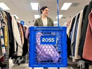 a person pushing a cart in ross