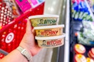 hand holding 3 bitchin sauce dip at target