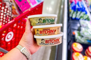 hand holding 3 bitchin sauce dip at target