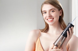 This $10 Water Flosser Sold 50,000 Units Last Month on Amazon  card image