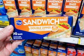 hand holding a box of kroger zip storage bags