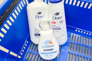 three bottle of Dove products