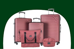 Stock image of the Travelhouse 5 Piece Hardside Luggage Set in the color "wine red"
