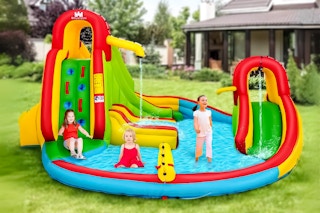 Lifestyle image of Costway Inflatable Bounce Park Splash Pool being used by children in yard