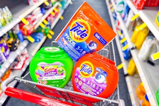 tide pods and gain flings in a cart