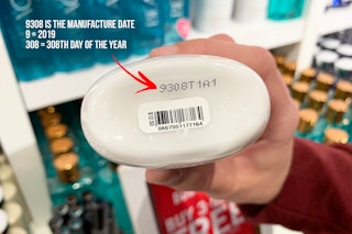 A Bath and Body Works bottle with a code printed on the bottom that reads 9308T1A1 and some added text explaining the code that says, "93...