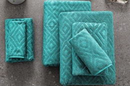 green/blue towel set on a counter