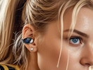 a person with earbuds in their ear