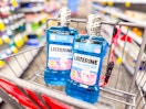 2 liseterine mouthwashes in a cart