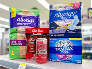always, old spice, and tampax on a counter