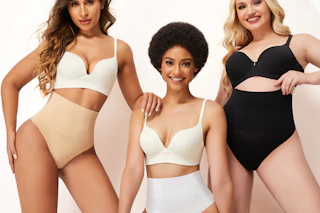 women modeling tummy control thongs