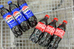 pepsi coca cola in shopping cart