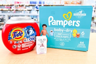 tide, pampers, and olay products on a store counter