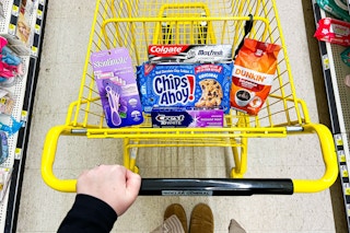 chips ahoy, skintimate, colgate, dunkin in a yellow shopping cart