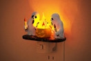 JandCase Halloween Night Light plugged into an outlet.