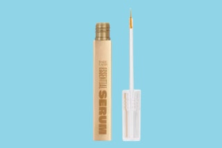 Babe Lash Original Lash Serum on a blue background