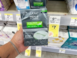 hand holding dove men's bar soap in walgreens