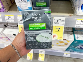 hand holding dove men's bar soap in walgreens