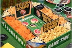  Gatherfun Football Party Supplies Kit on a table.