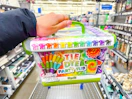hand holding tie dye party tub in walmart aisle