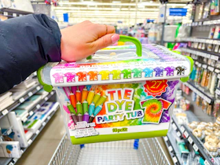 hand holding tie dye party tub in walmart aisle