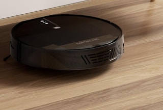 a robot vacuum on a hardwood floor