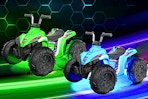 Lifestyle image of the Kids Trax ATVs in blue and green glow in the dark
