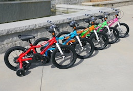 red, blue, orange, blue, green, and pink Dynacraft bikes