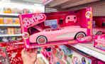 hand grabbing a hot wheels barbie rc corvette off a target shelf