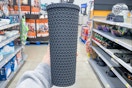 black textured tumbler
