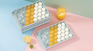 ice trays with ice on a table