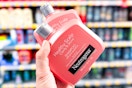 hand holding neutrogena shampoo conditioner