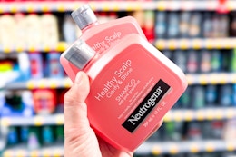 hand holding neutrogena shampoo conditioner